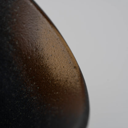 Dark floral medallion cup, rim and interior detail.