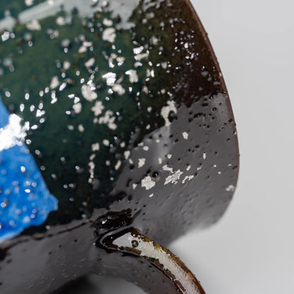Blue ginsai mug, side view showing the shape and surface.