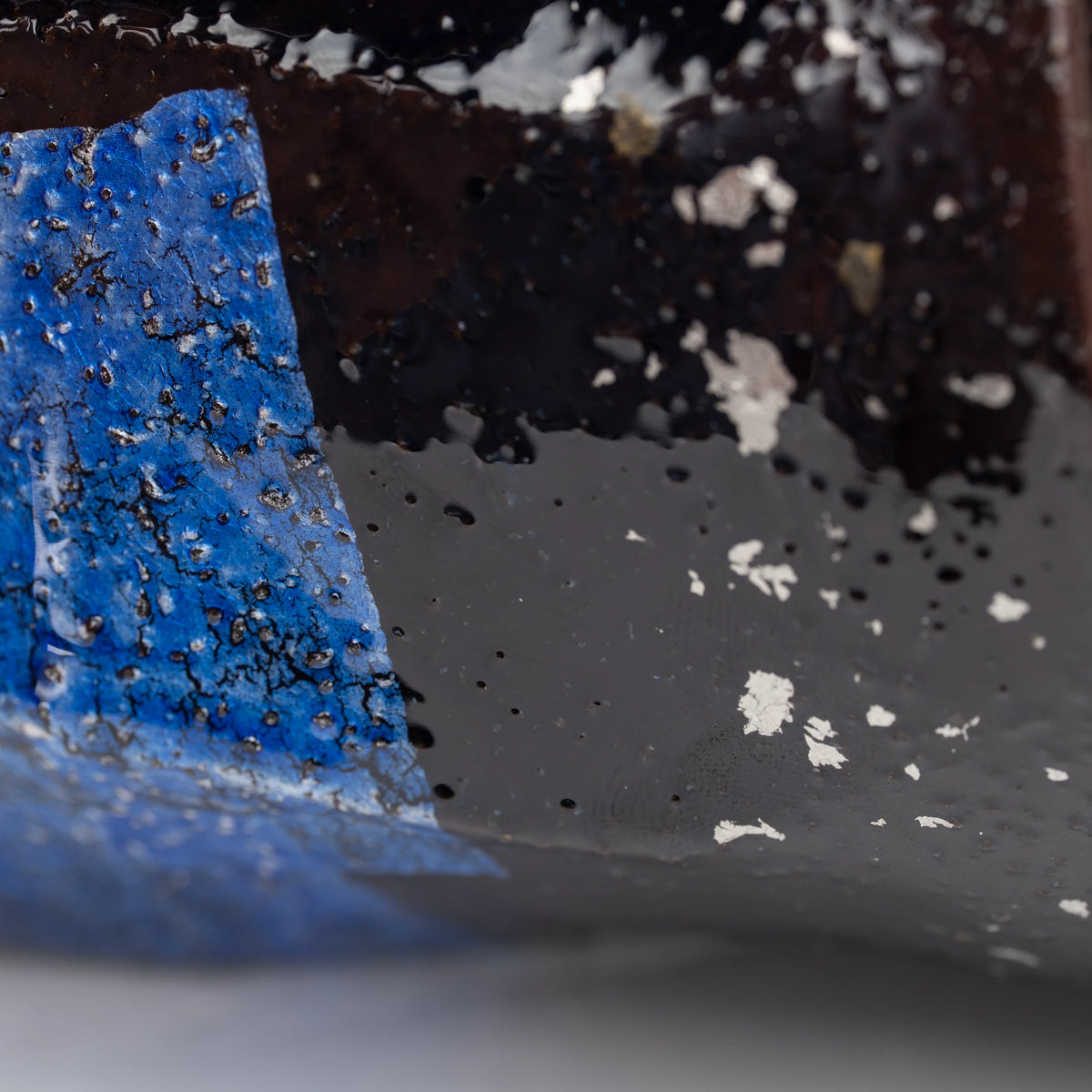 Blue ginsai mug, side view showing the shape and surface.