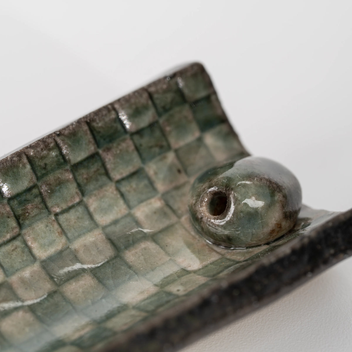 Green mosaic incense holder, rounded stick insert.