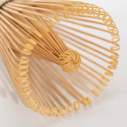 Paw-print bamboo mini whisk, fine bamboo tines.