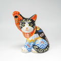 Maneki-neko noir Kutani-yaki — chat porte-bonheur en porcelaine peint à la main, motif Fuji blanc et Kikusui