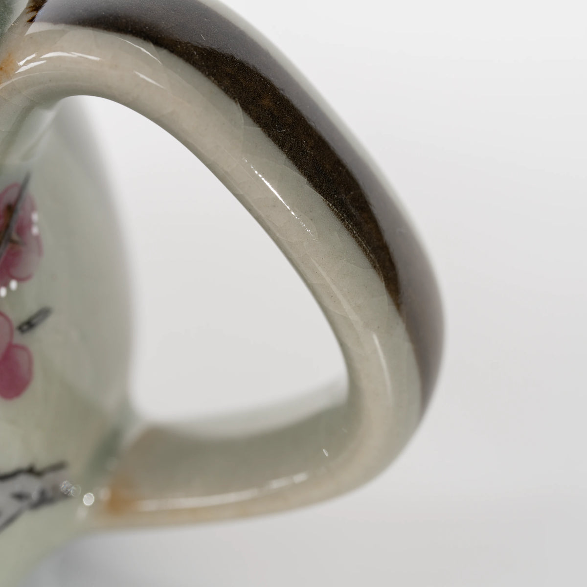 Sparrow teapot, handle detail.