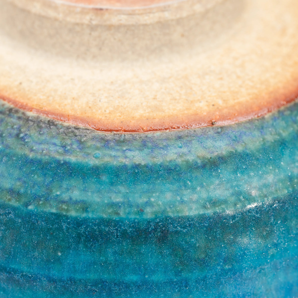 Blue Tsuyukusa matcha bowl, blue glaze and purple-brown band detail.
