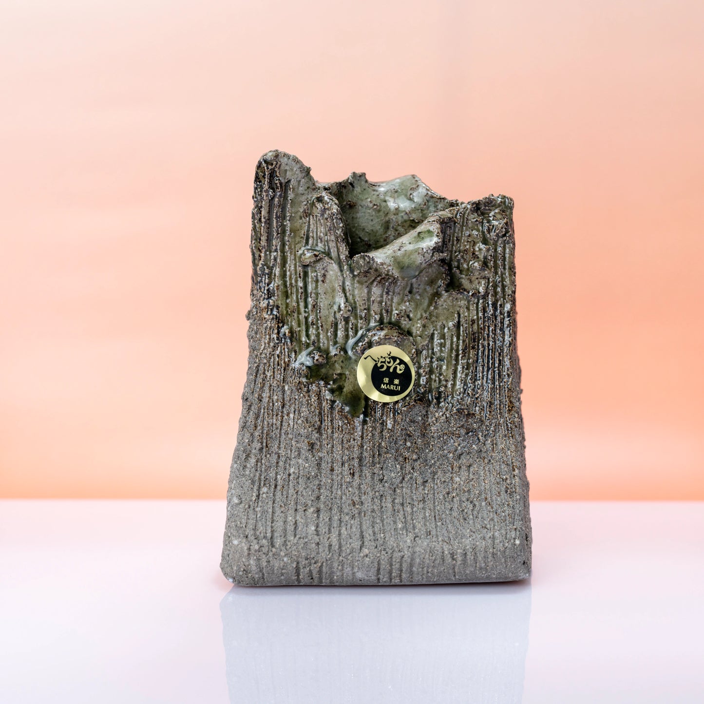 Straight-on front view of a Shigaraki ware bud vase