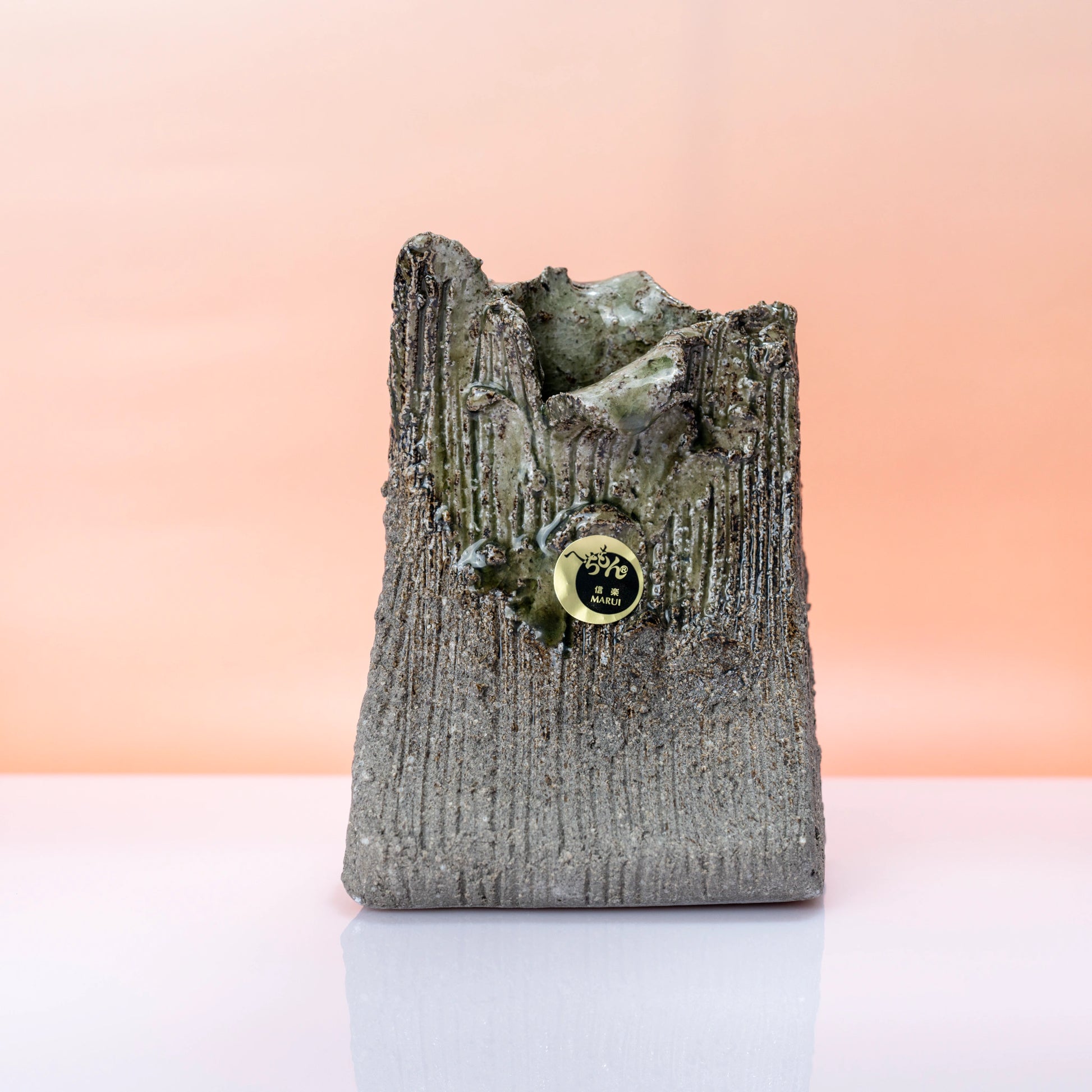 Straight-on front view of a Shigaraki ware bud vase