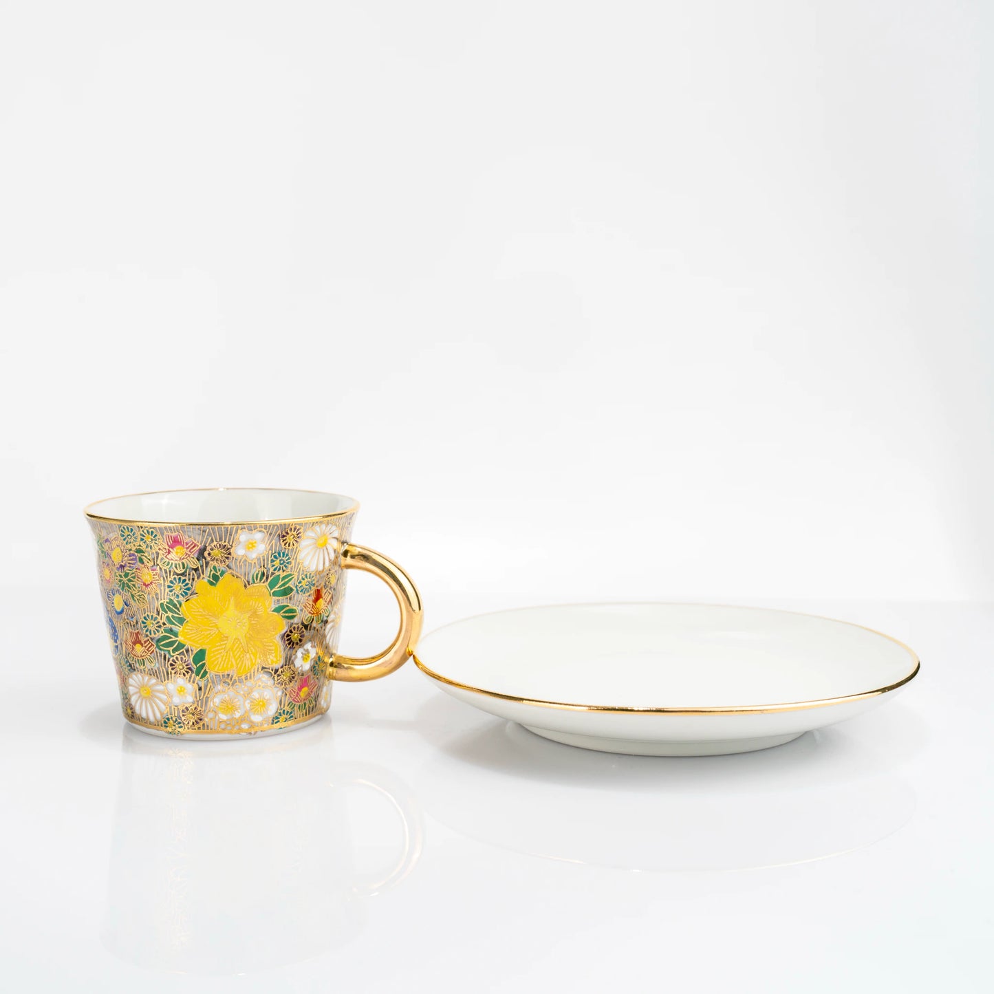 Kutani gold floral cup and saucer angled side view