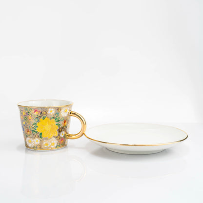 Kutani gold floral cup and saucer angled side view
