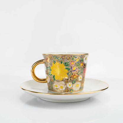 Kutani gold floral cup and saucer set front view on white background