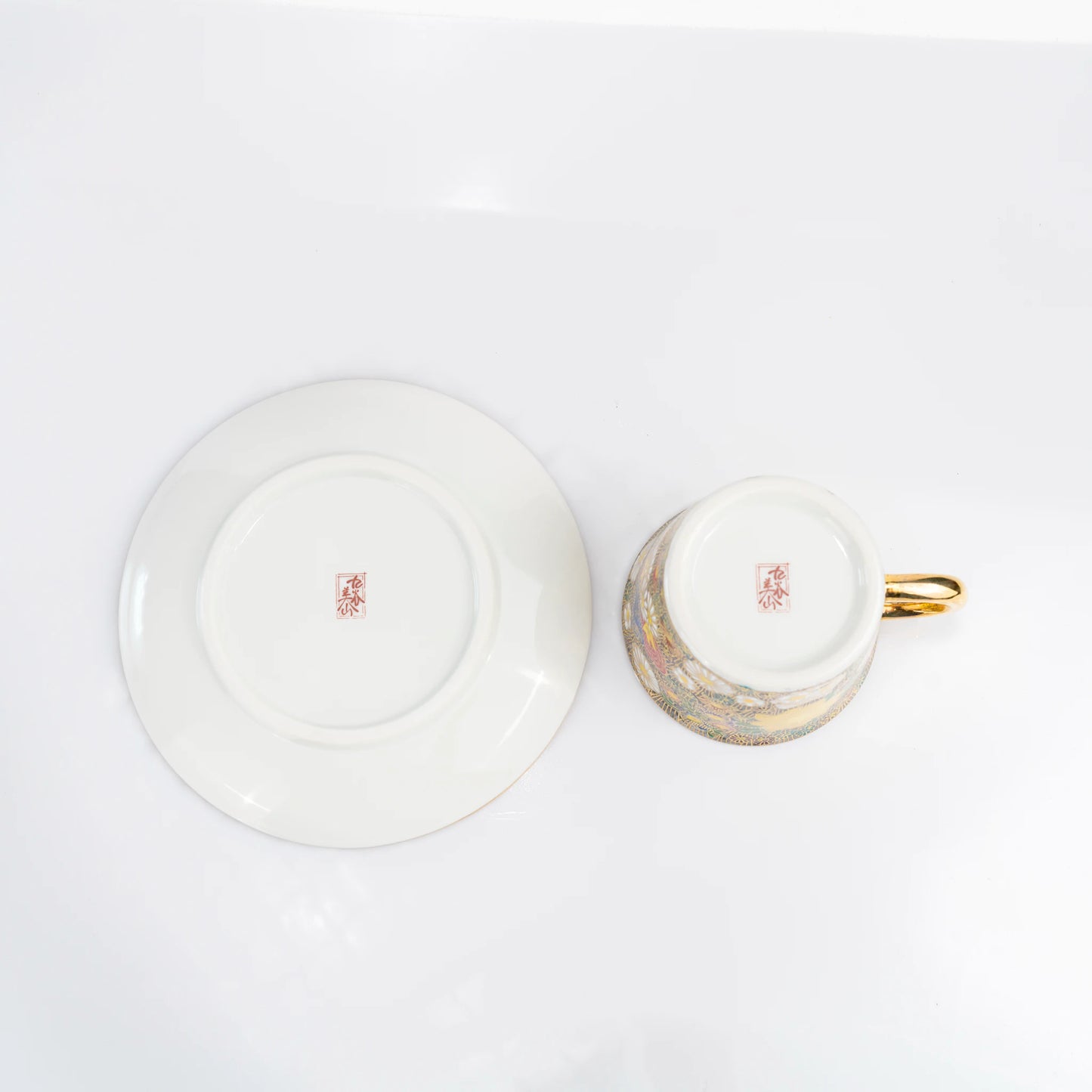Top view of Kutani cup and saucer showing underside and cup opening