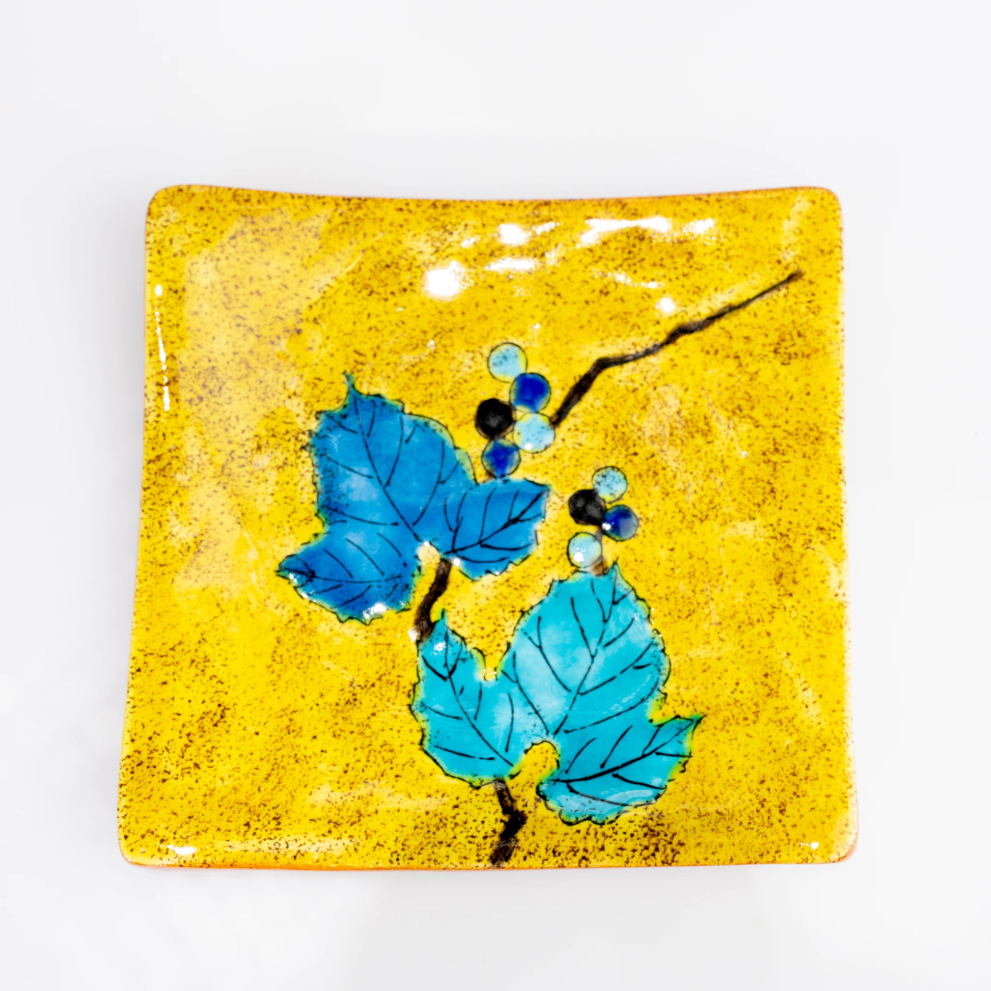 Single Kutani square plate in yellow wild grape design top view