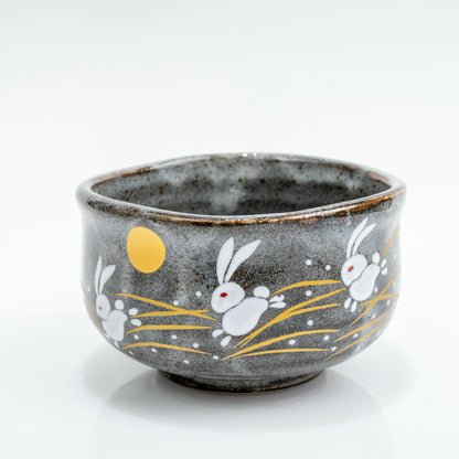 Front three-quarter view of Kutani hare rabbit matcha bowl