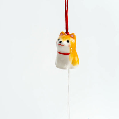 Shiba parent and puppy wind chime hanging together, front angle