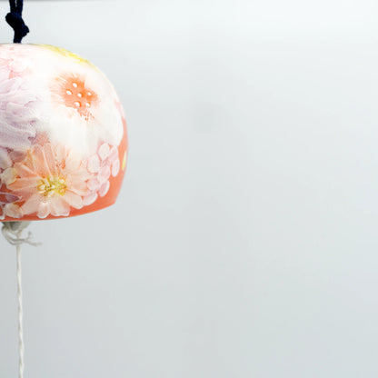 Flat lay of Yuzuriha floral wind chime with blue paper strip and tag