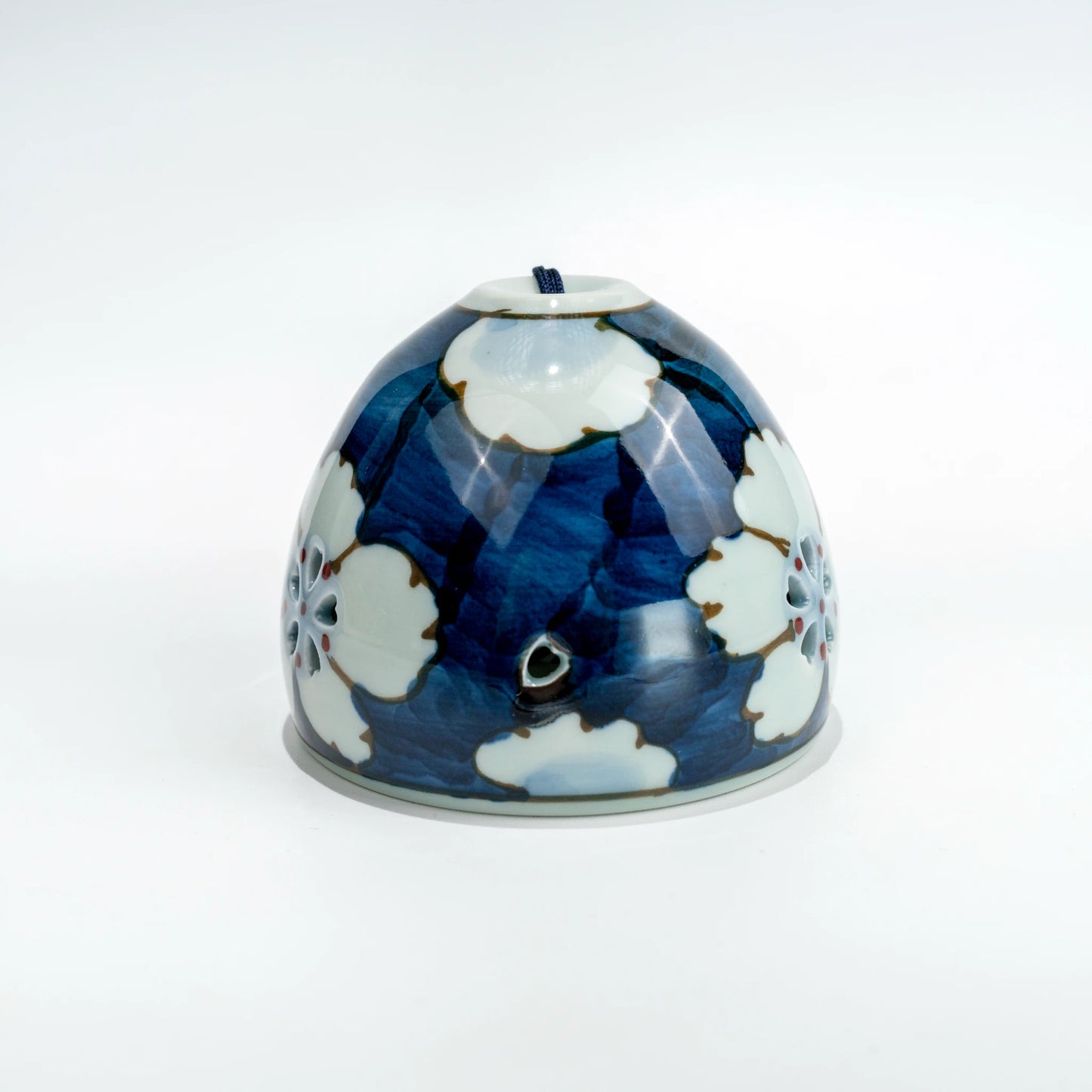 Top view inside Arita floral openwork ceramic wind chime bell
