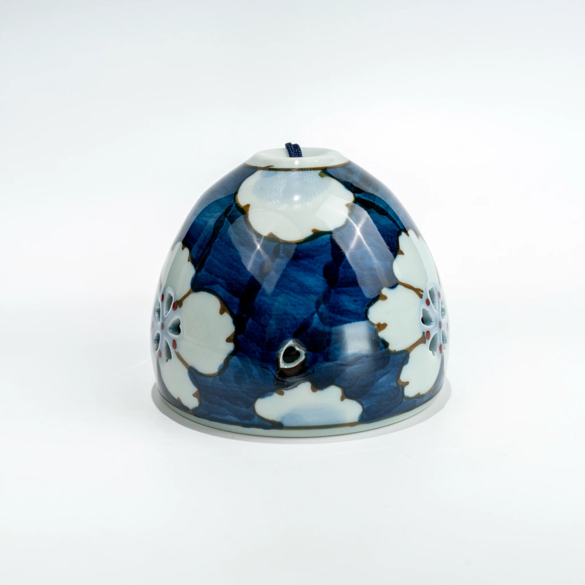 Top view inside Arita floral openwork ceramic wind chime bell