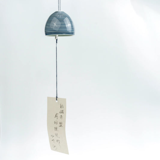 Full hanging view of Arita stripe wind chime with paper strip