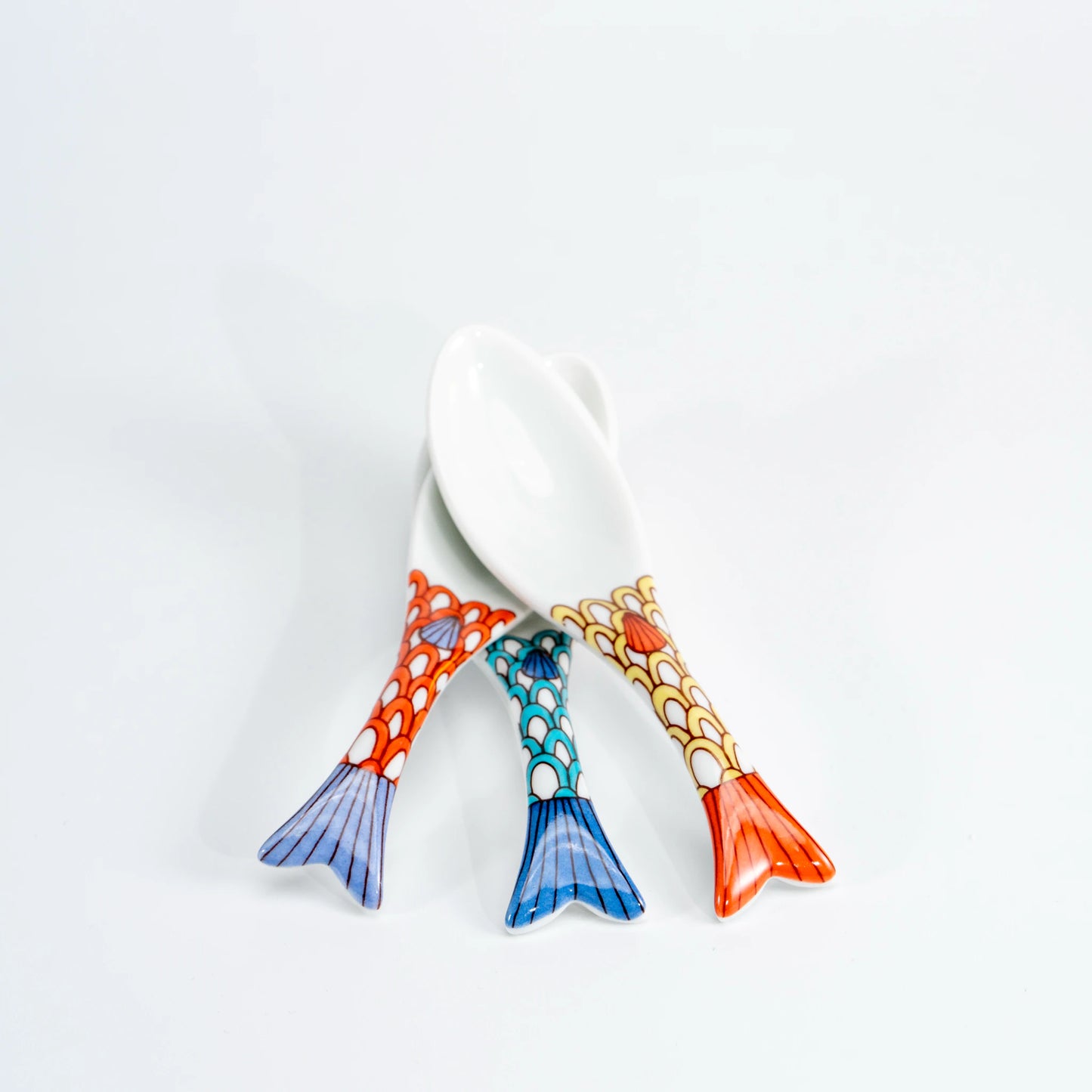 Kutani whale renge spoons in three color options with colorful whale-tail handles