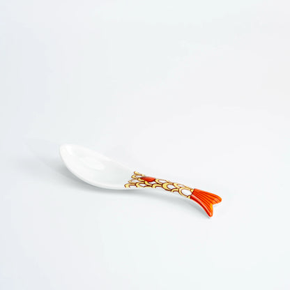 Single Kutani whale renge spoon with an orange patterned whale-tail handle