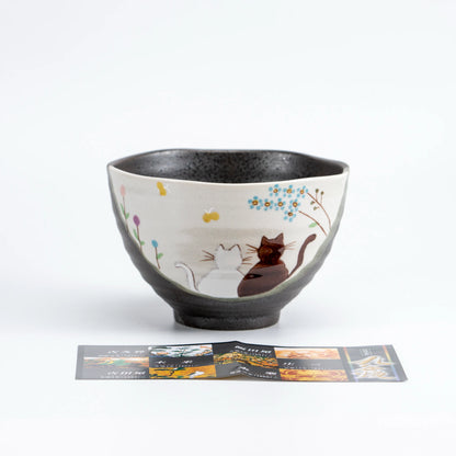 Side view of Kutani Hidamari rice bowl showing soft hand-painted design