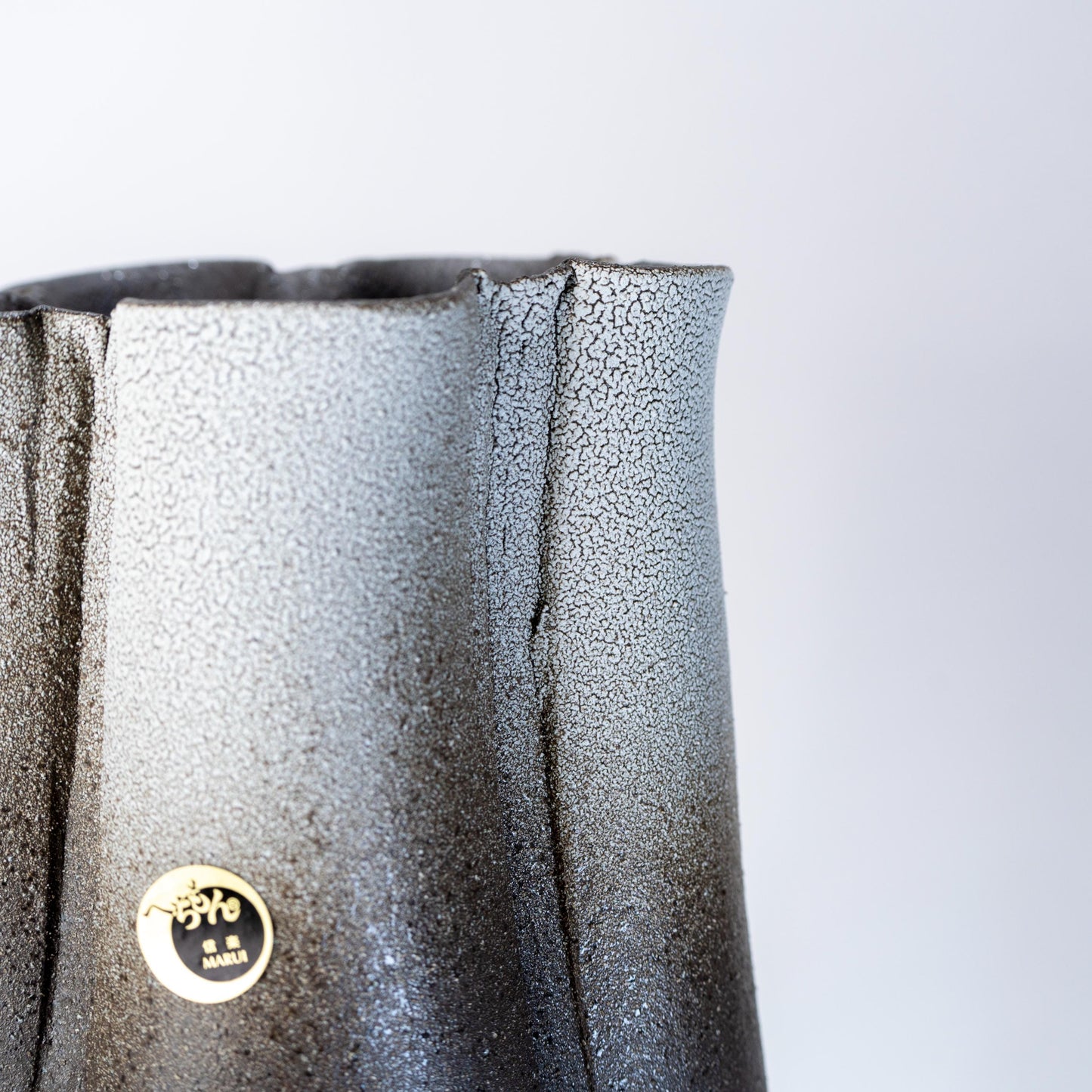 Close-up of the upper body and glaze texture on a Shigaraki ikebana vase