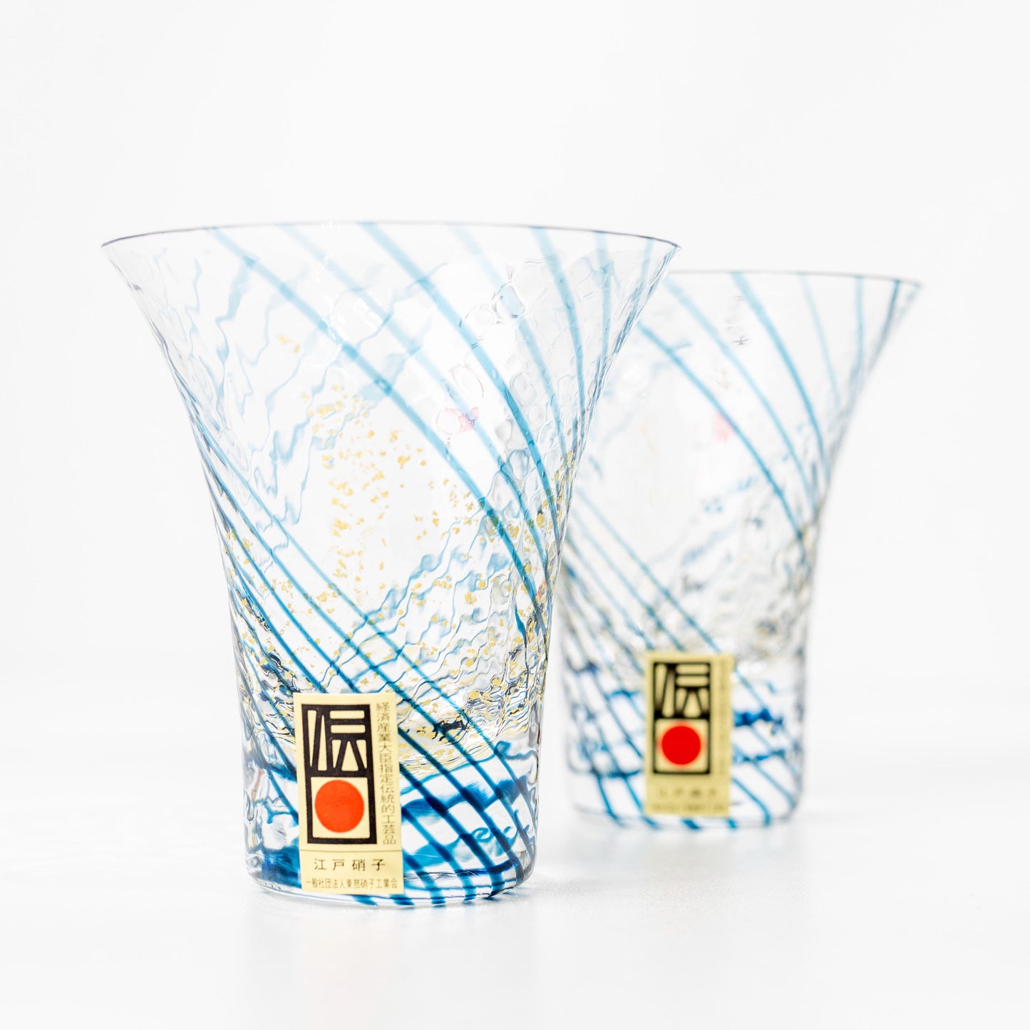 Front display of Edo glass sake cup on white background