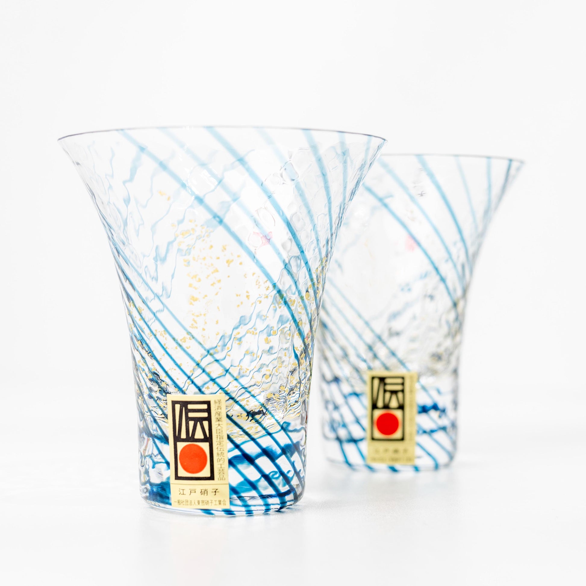 Front display of Edo glass sake cup on white background