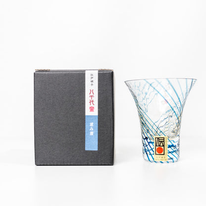 Edo glass sake cup with blue and gold leaf effect beside box
