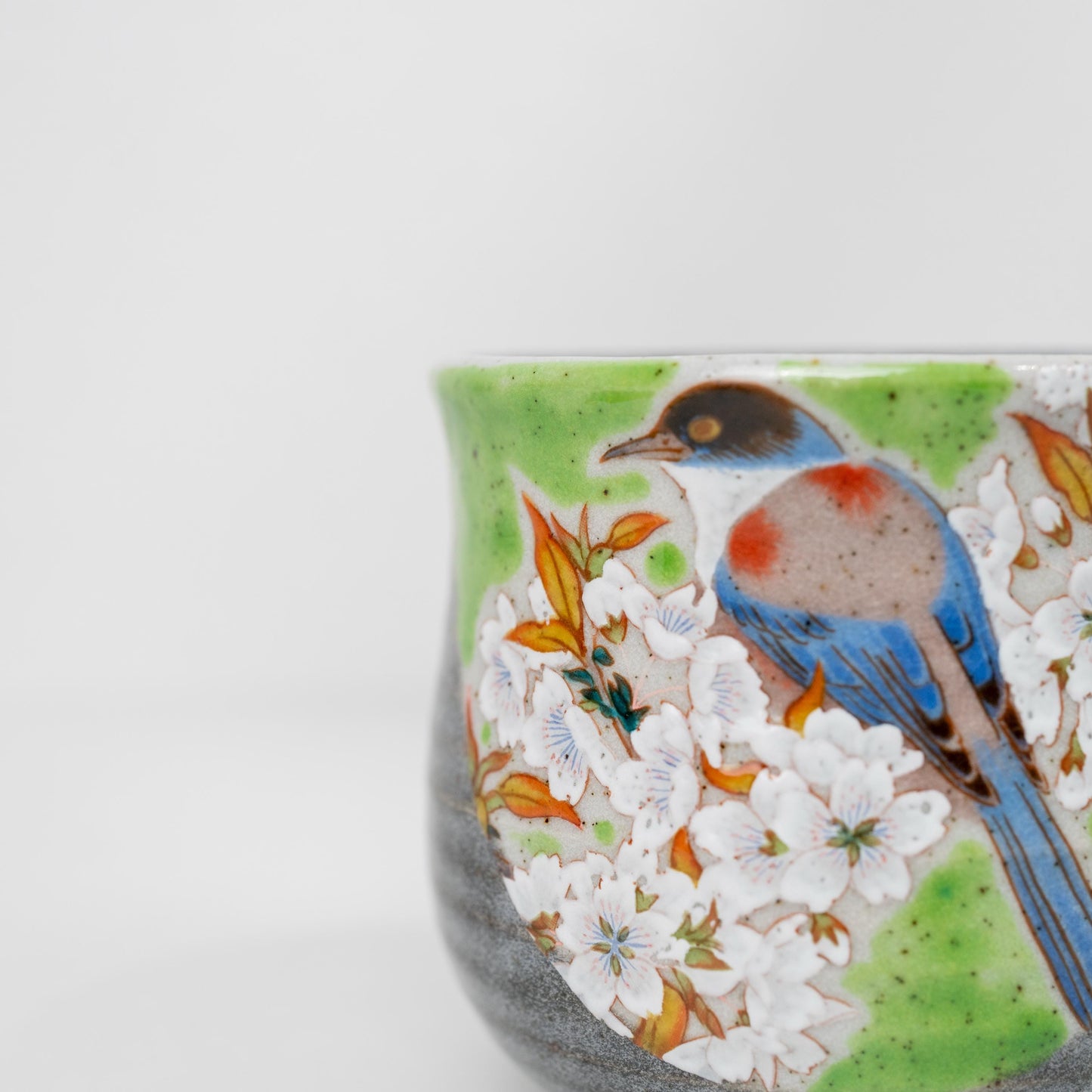 Single Kutani mug with bird and mountain cherry blossom motif