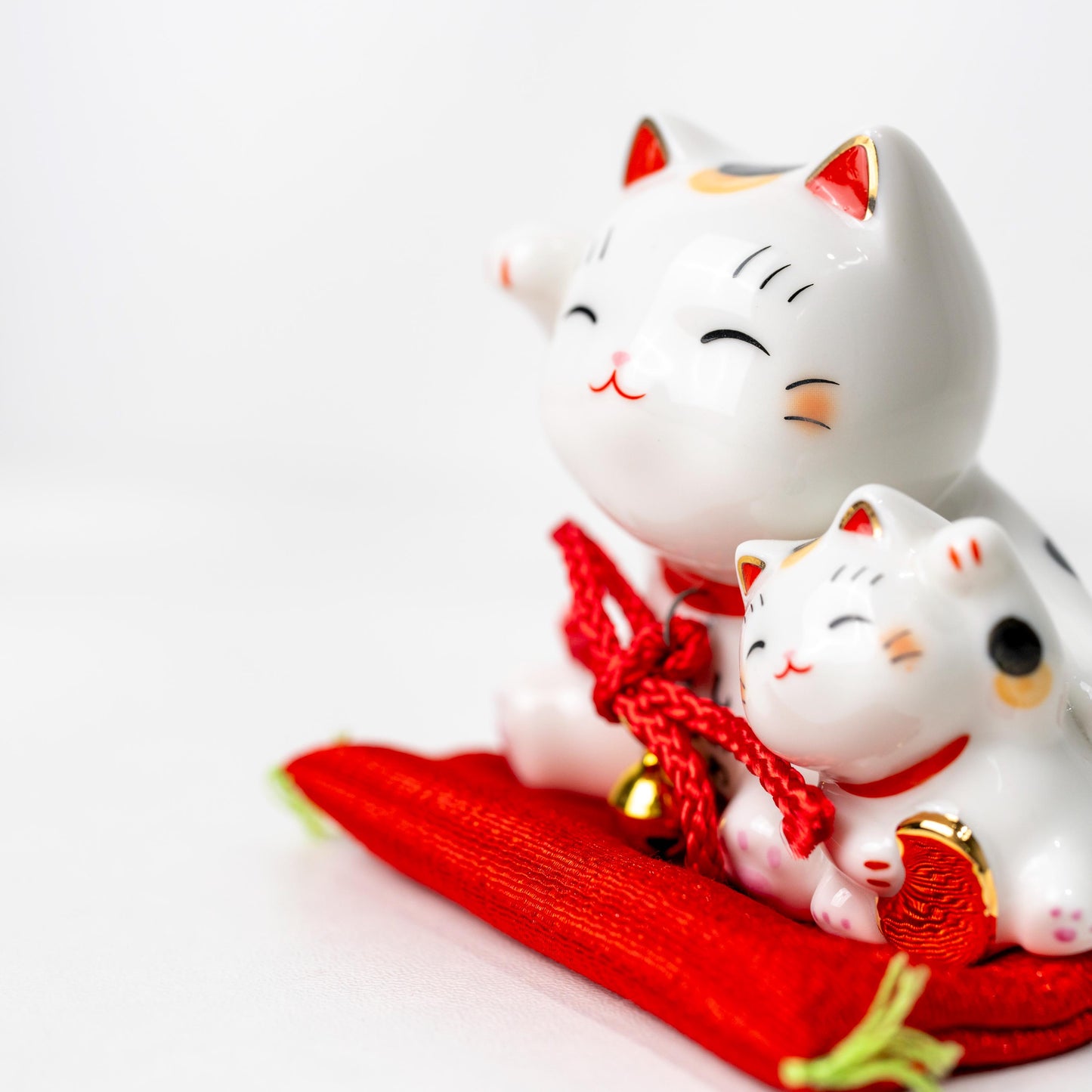 Front angle of ceramic mother and kitten Maneki Neko