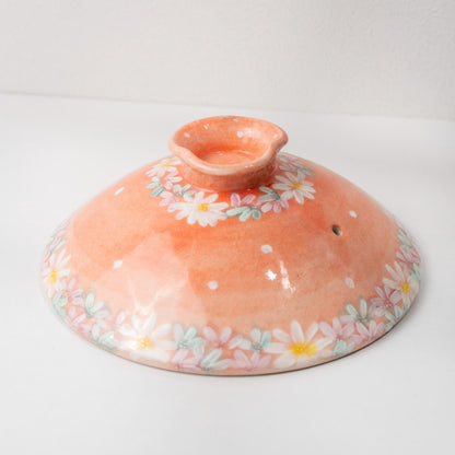 Underside of the clay pot body showing base and form