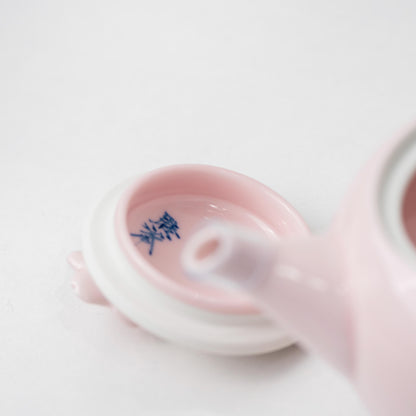 Close-up of the iridescent pink glaze on a porcelain kyusu