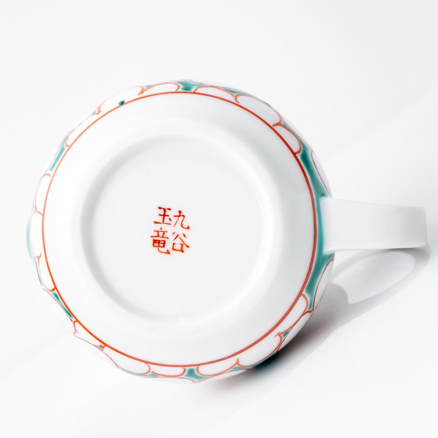 Close-up of yunomi cup from Kutani plum blossom tea set