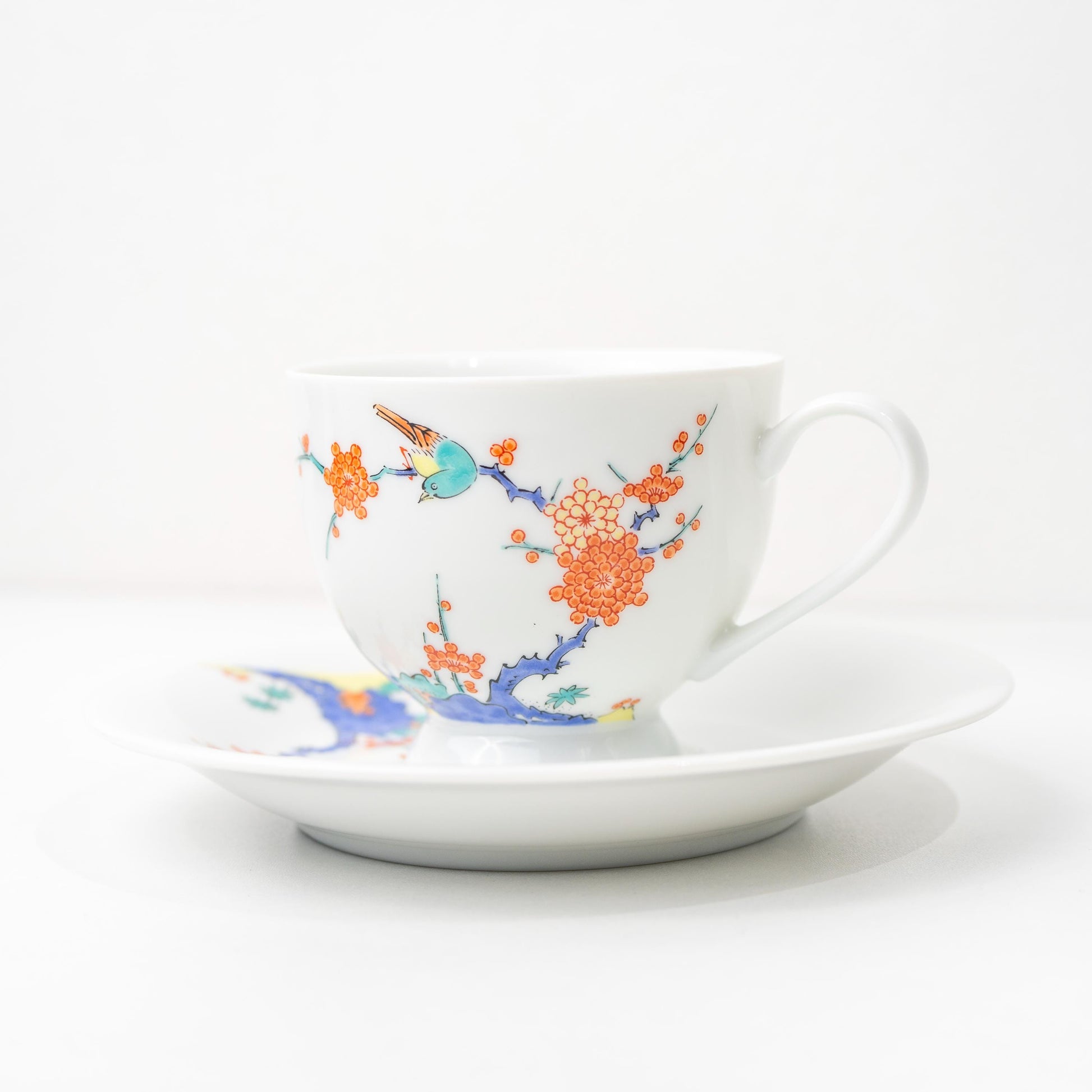 Arita bird and plum blossom coffee cup and saucer set in hand-painted porcelain