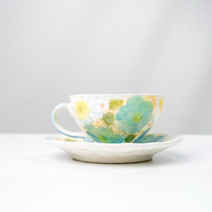 Angled side view of handmade ceramic cup