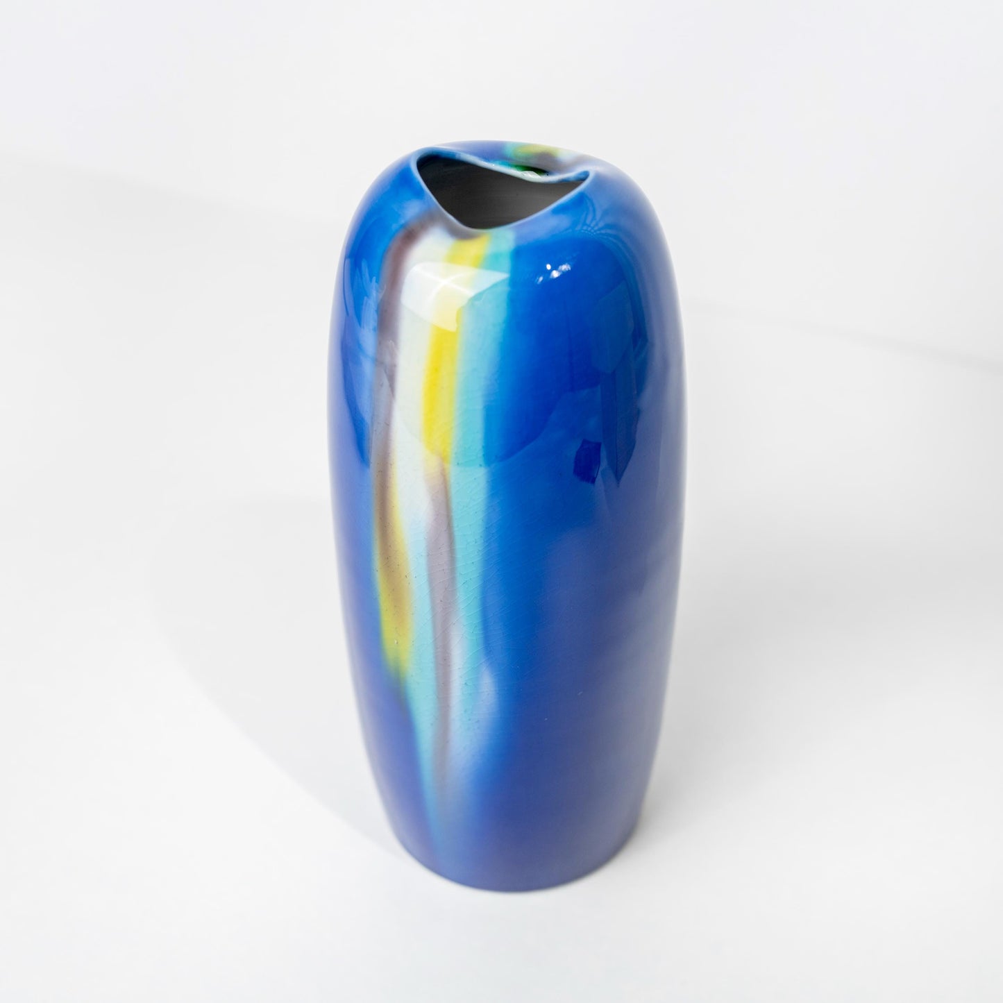 Kutani blue yusai porcelain vase on white background