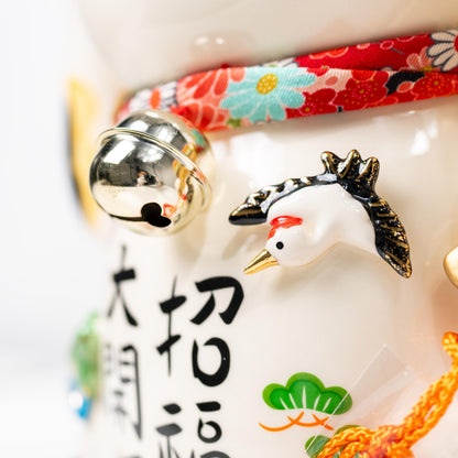 Side detail of decorative motifs on Yakushi Kiln lucky cat