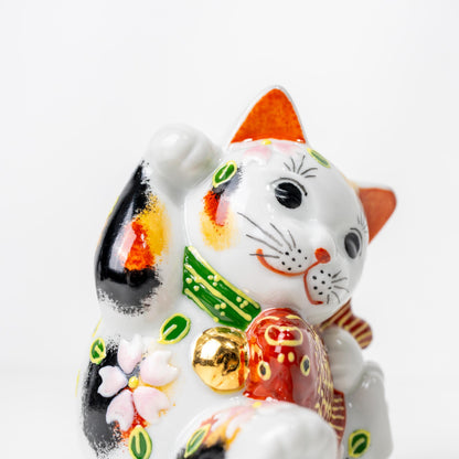 Front angle of Kutani Tai Maneki Neko figurine