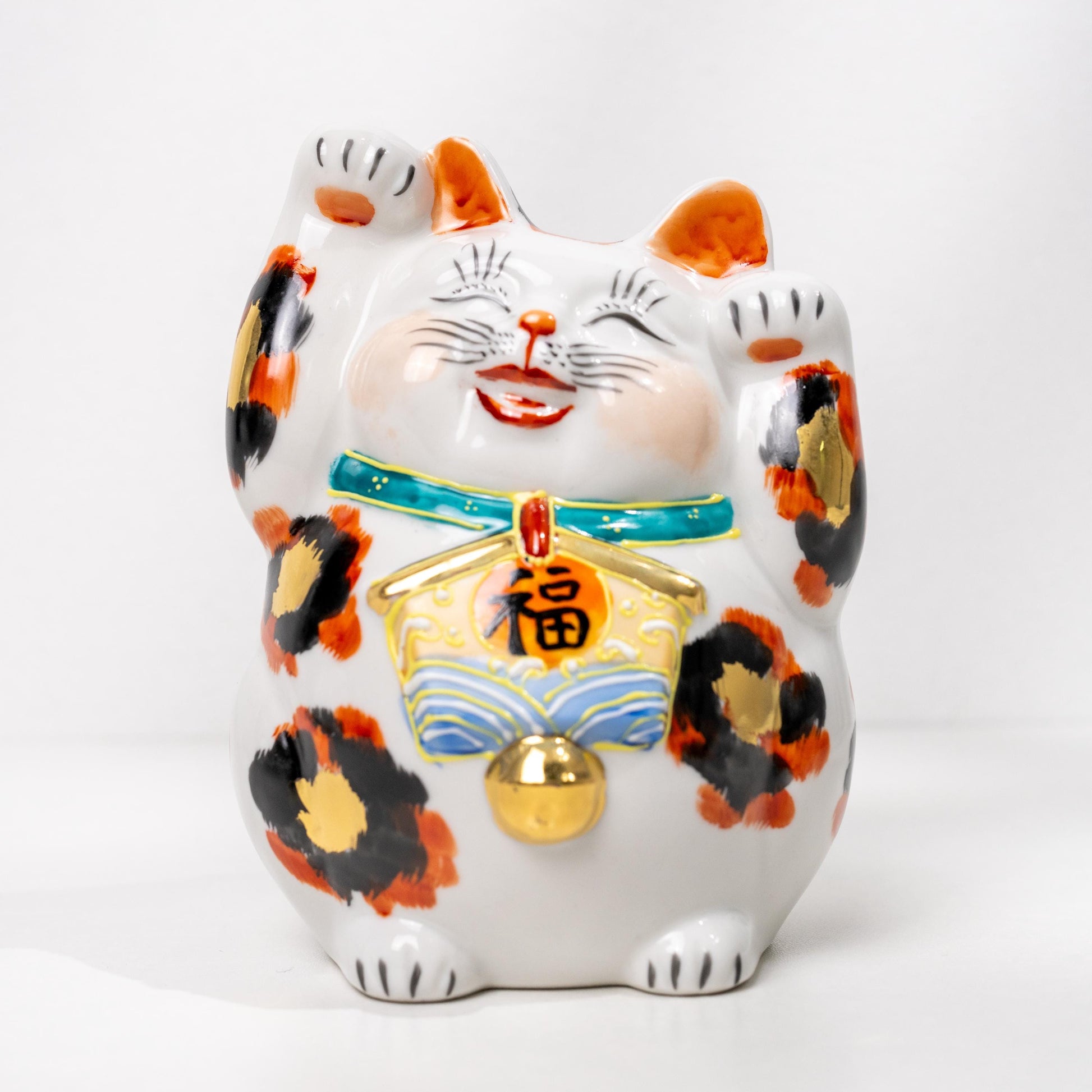 Back view of Kutani lucky cat figurine