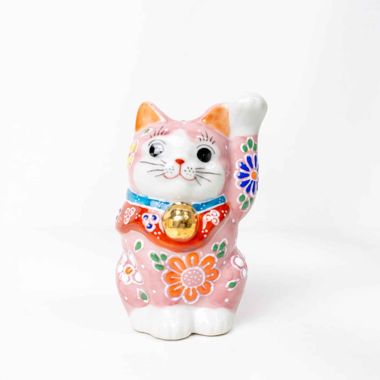 Pink Kutani ware Maneki Neko figurine on white background