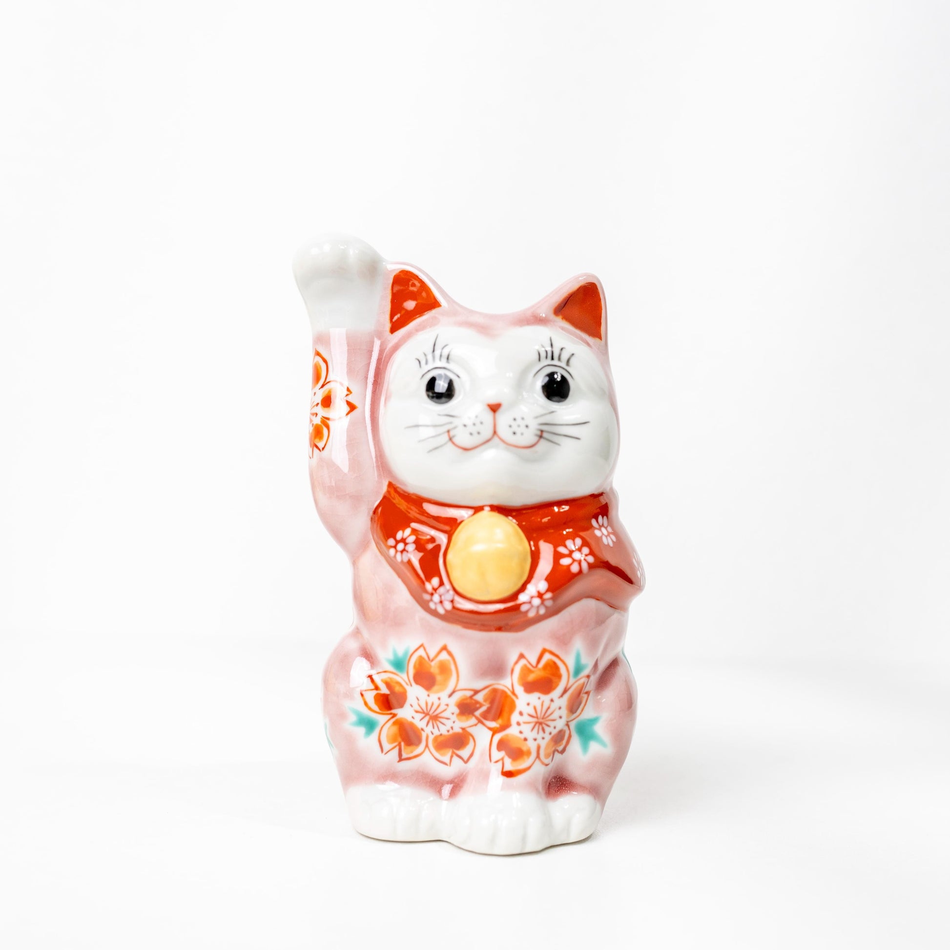 Kutani pink sakura Maneki Neko figurine on white background