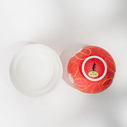 Interior view of red Arita lidded bowl in white glazed porcelain