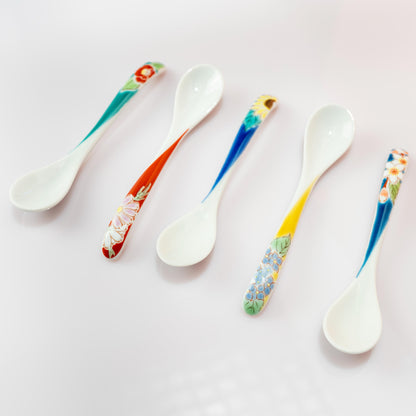 Assorted Kutani floral spoons displayed together