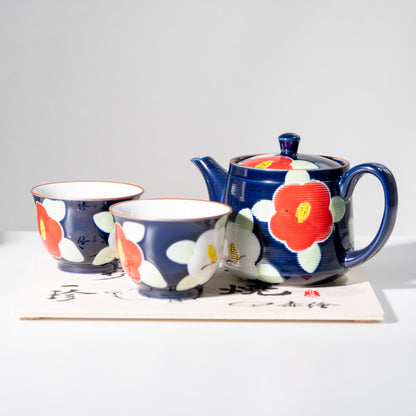 Front view of Arita porcelain tea set with teapot and two yunomi cups