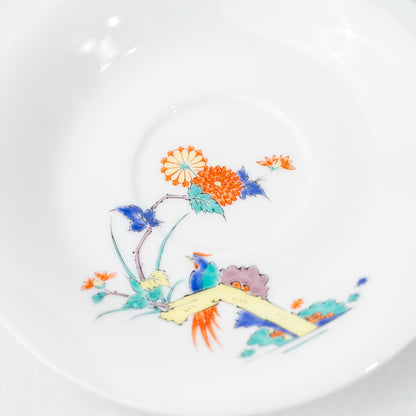 Close-up of bird and floral motif on a hand-painted Arita cup
