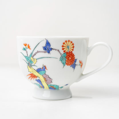 Angled view of Arita bird and floral cup and saucer set