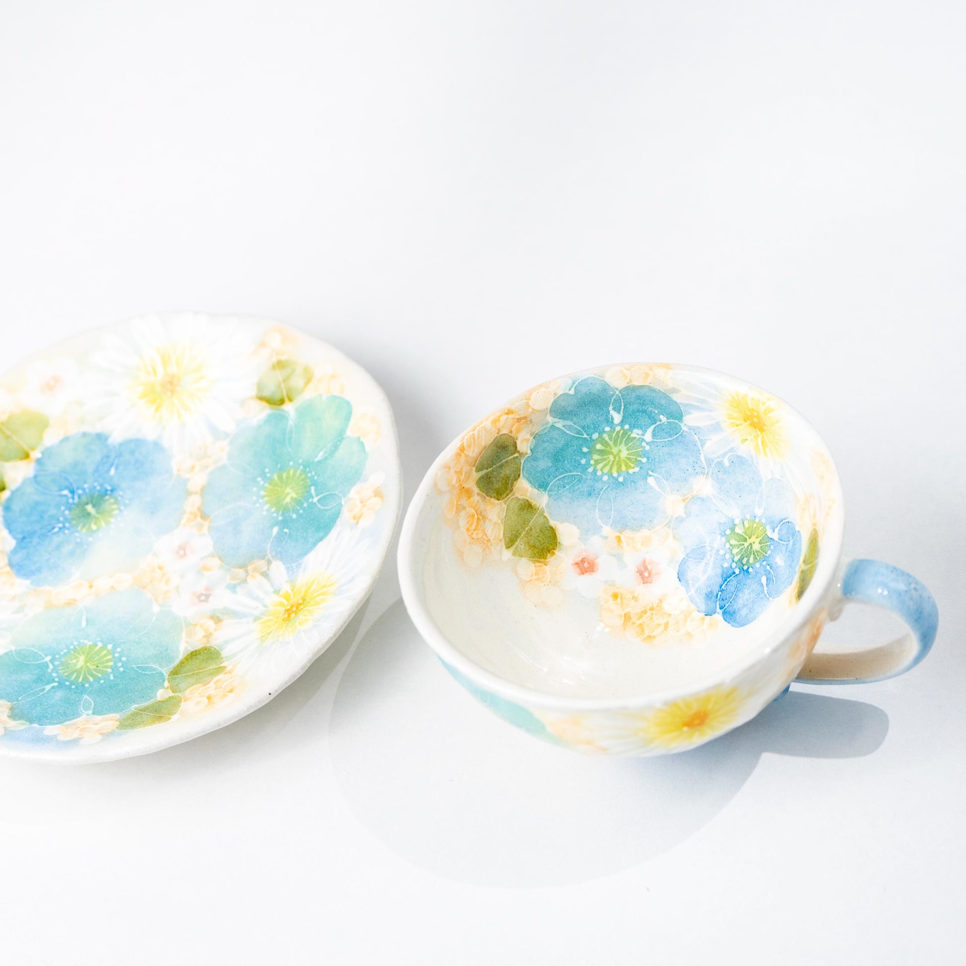 Front display of floral cup and saucer pair
