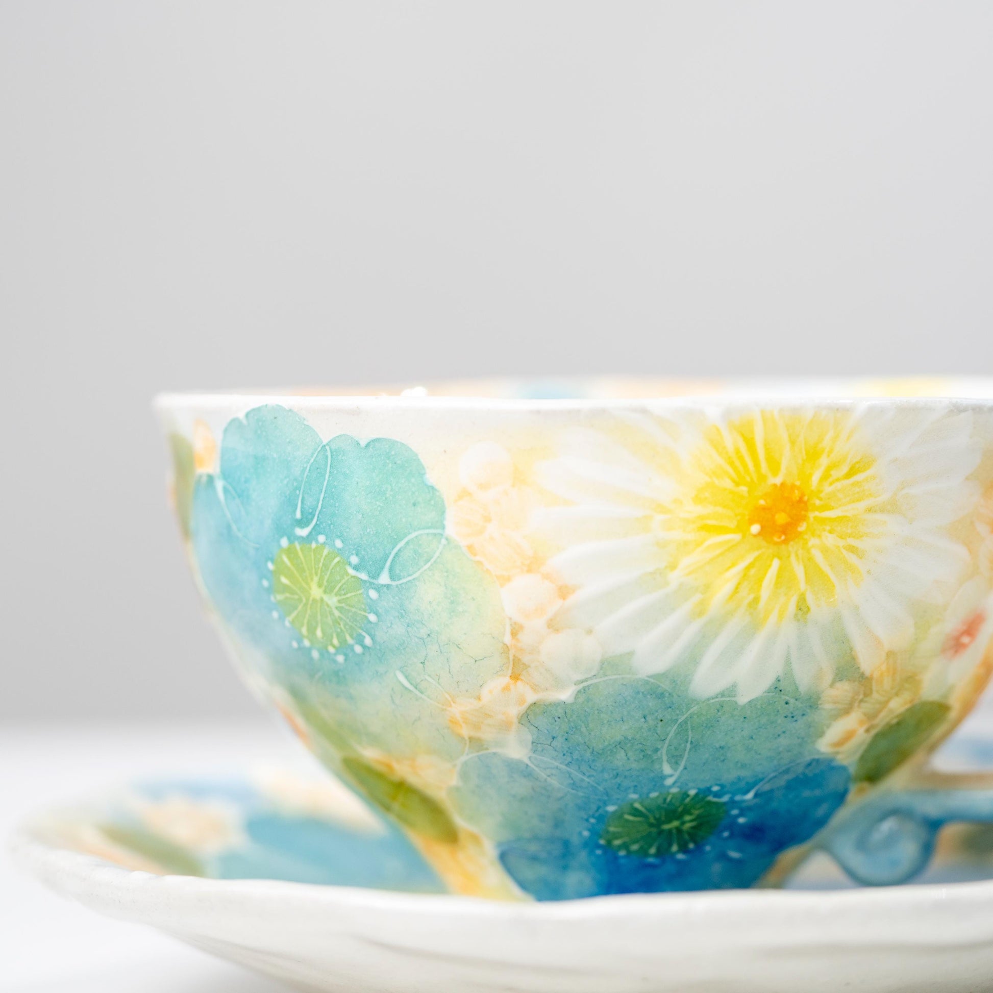 Full display of floral coffee cup and saucer set