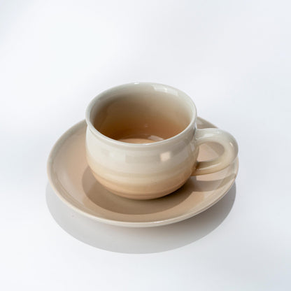 Handmade Hagi yaki cup and saucer with soft blush crackle glaze