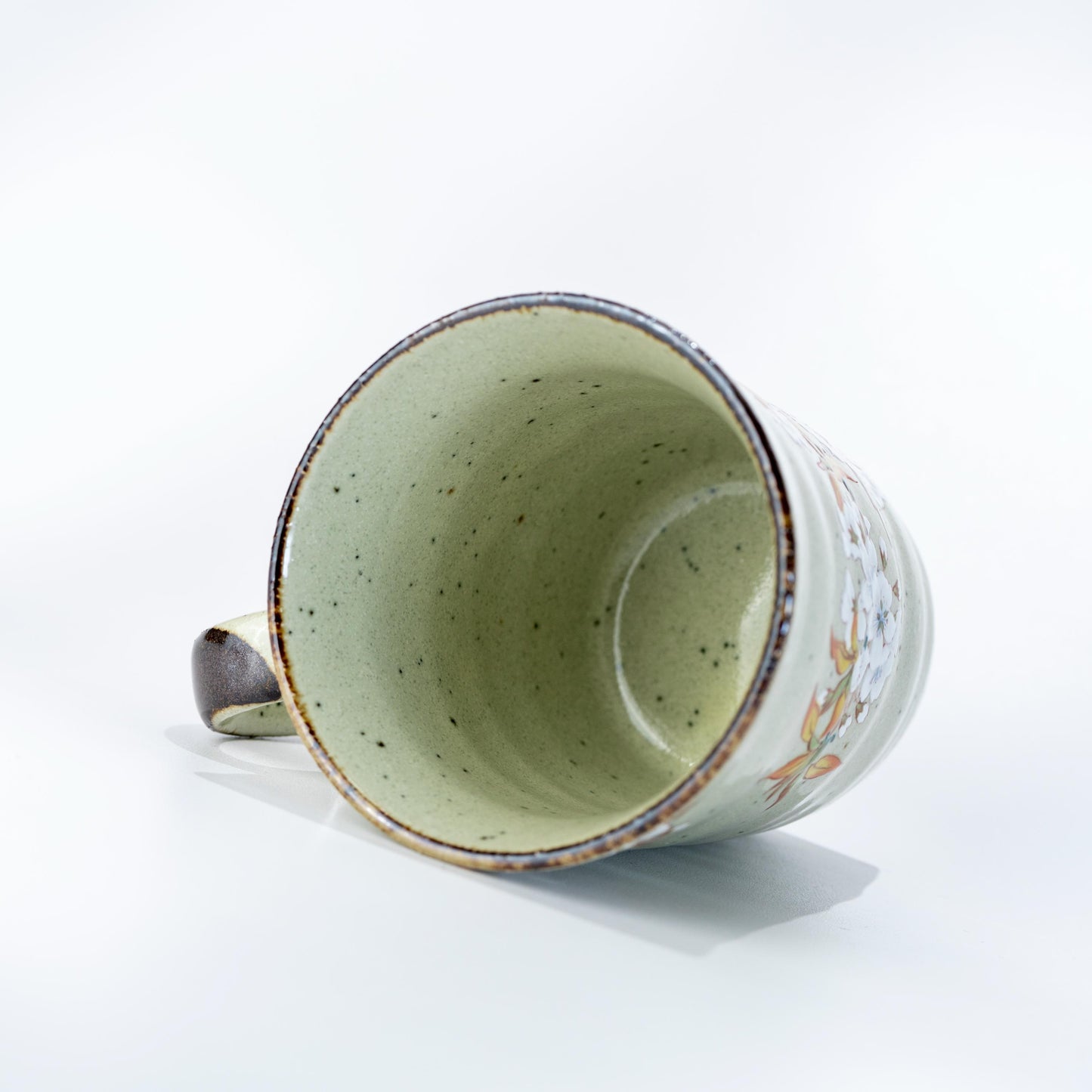 Top view of Kutani ware mug showing interior glaze and cup opening